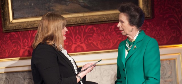 HRH The Princess Royal presenting an Award to Liz Willis, Head of Learning & Development, Caring Homes Group